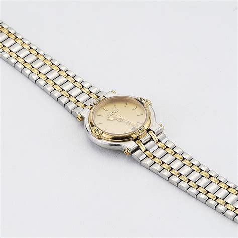 ladies two toned gucci quartz watch